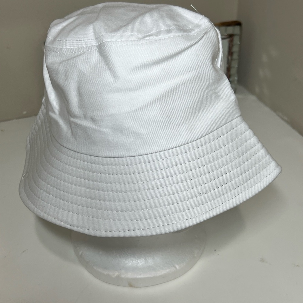 Classic White Bucket Hat with Smooth Fabric and Circular Stitching